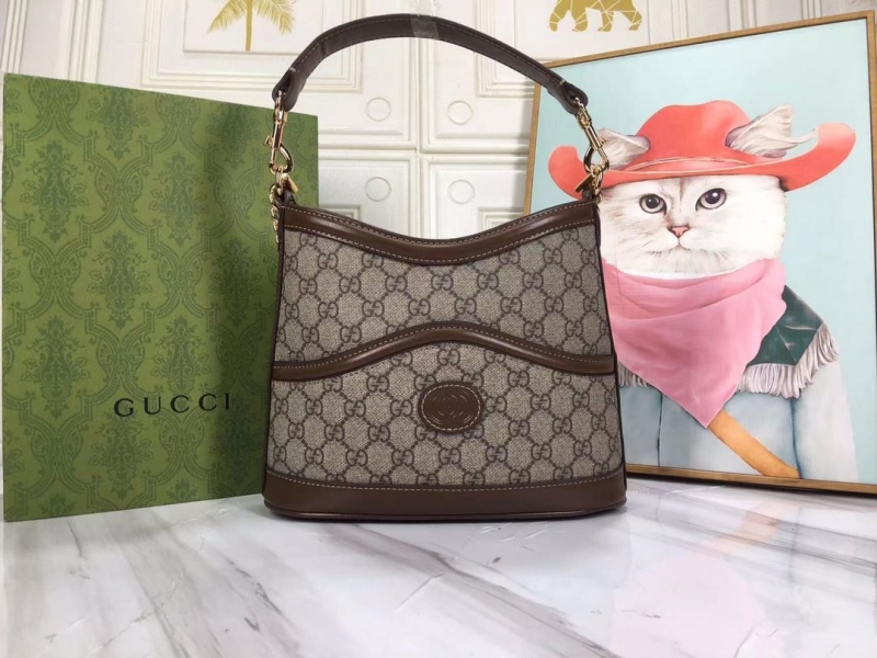 G*u*i top handle bags